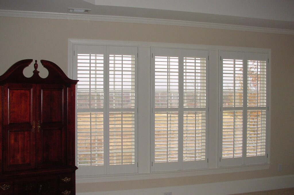 2 1/2'' Interior Shutters with a 2'' center rail