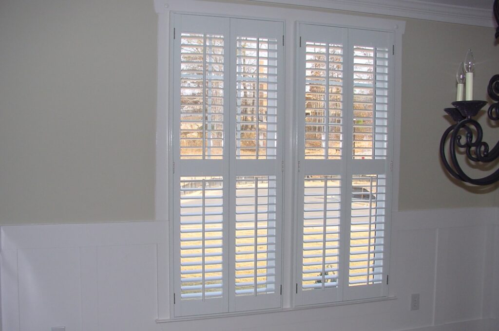 2 1/2'' Plantation Shutters with a 4'' center divider