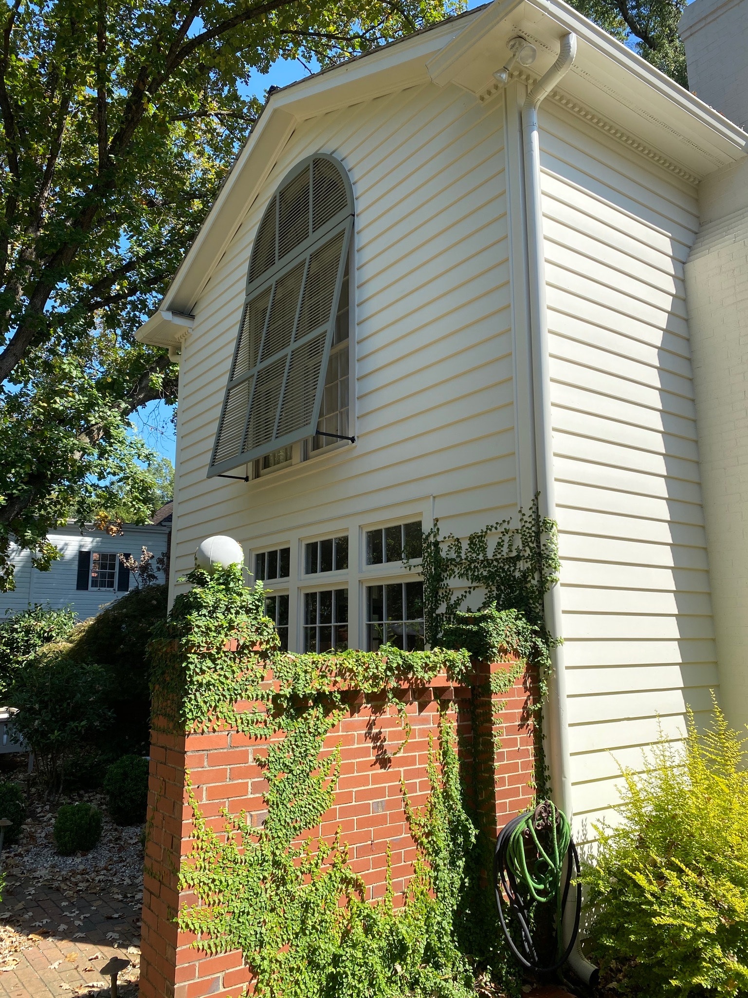 Wooden Arch Top Bahama Shutters in Charlotte, NC