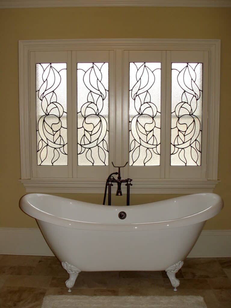 Custom Stained Glass Plantation Shutters in a bi-fold group