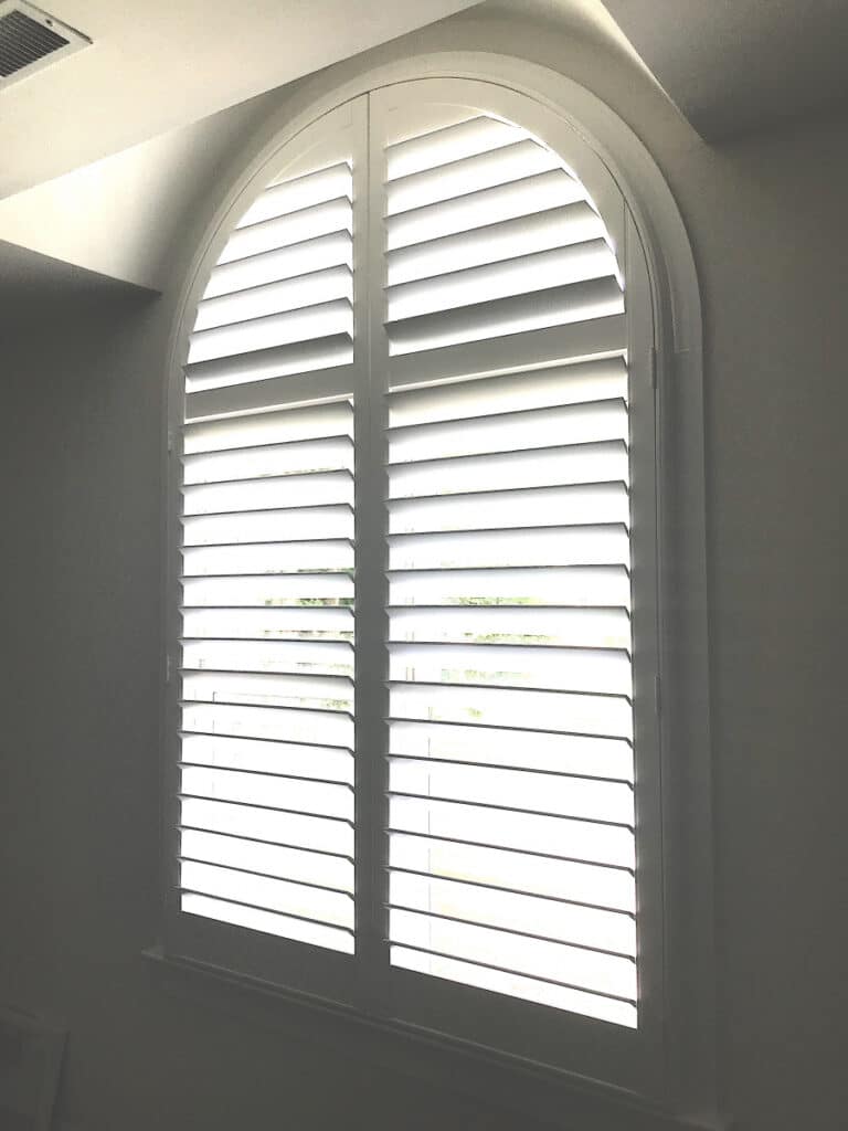 Arch Top Shutters with a Divider Rail